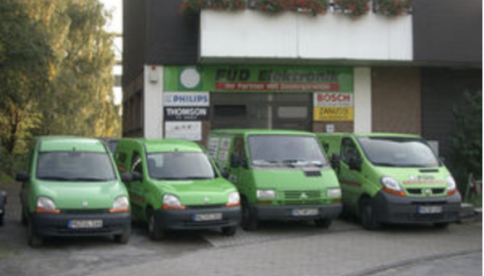 Fuhrpark und Ladenansicht